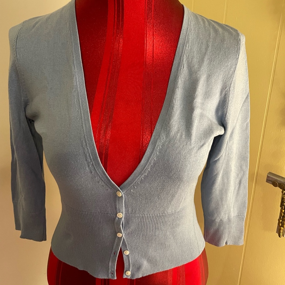 AnnTaylor petite size Medium. Light blue v-neck cardigan. 75%silk